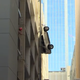 Image for article titled Holy Shit Watch This Car Dangle From A Parking Garage Live